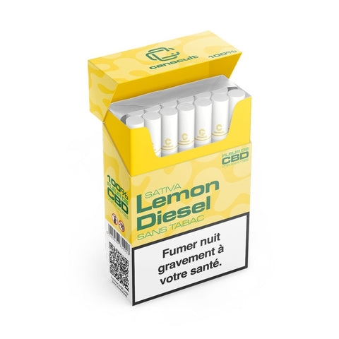 Photo d'un paquet de 20 pré-roulés LEMON DIESEL de la marque CANACULT, mettant en avant des cigarettes pré-roulées en chanvre 100% naturel. Le design du paquet souligne les mentions "sans tabac" et "sans nicotine", avec un arôme citronné et épicé caractéristique de la variété Lemon Diesel.